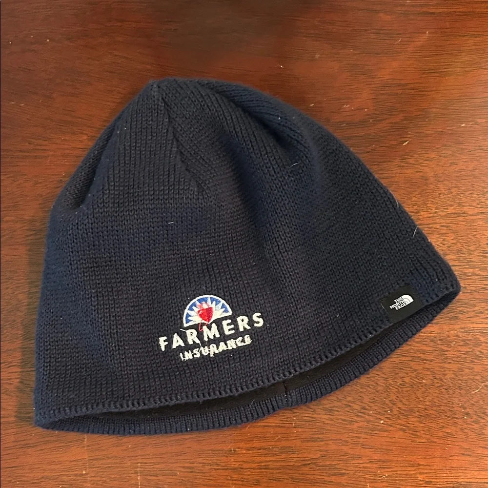 E49 The North Face Navy Knit Beanie Farmers Insurance NWOT